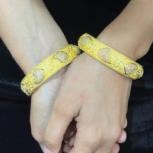 iconic gold look bangles